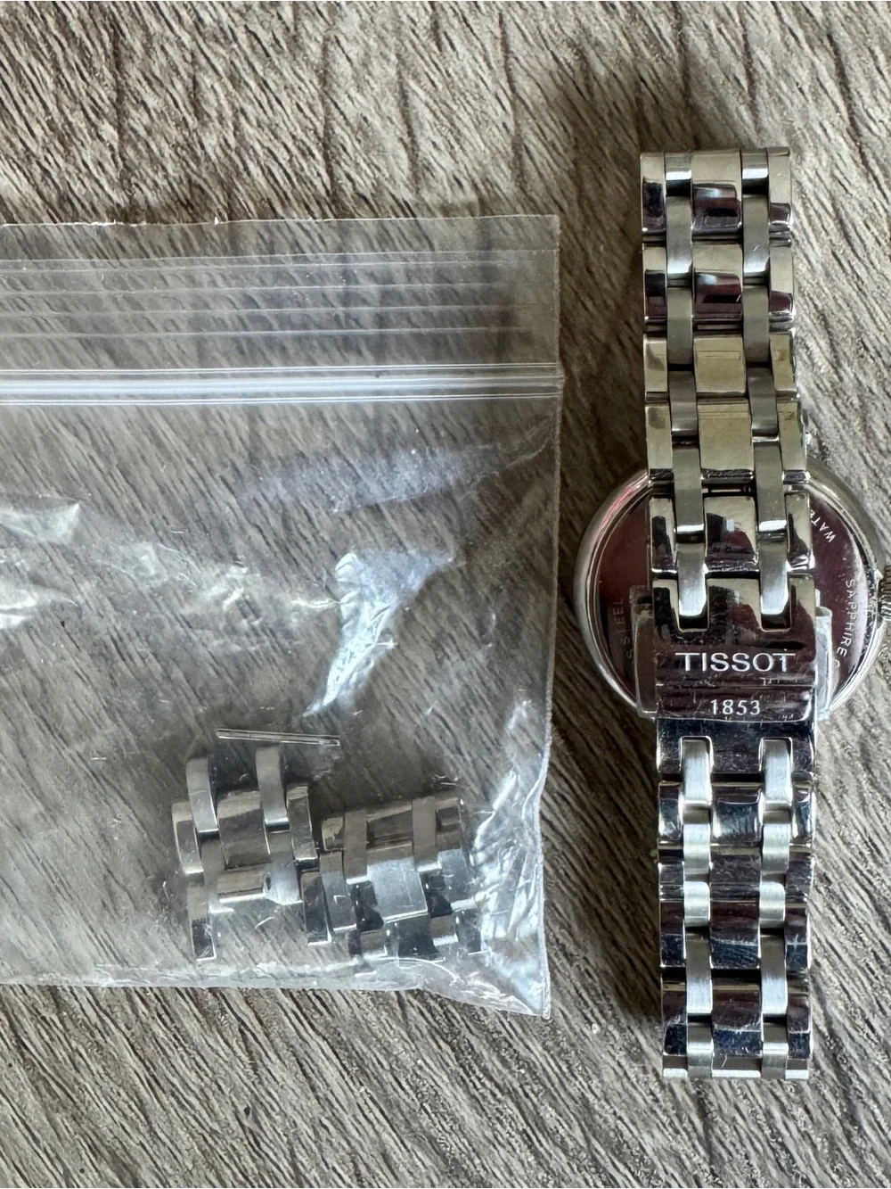 LIKE NEW - TISSOT LADIES STAINLESS STEEL BLUE FACE BELLISSIMA SMALL WATCH